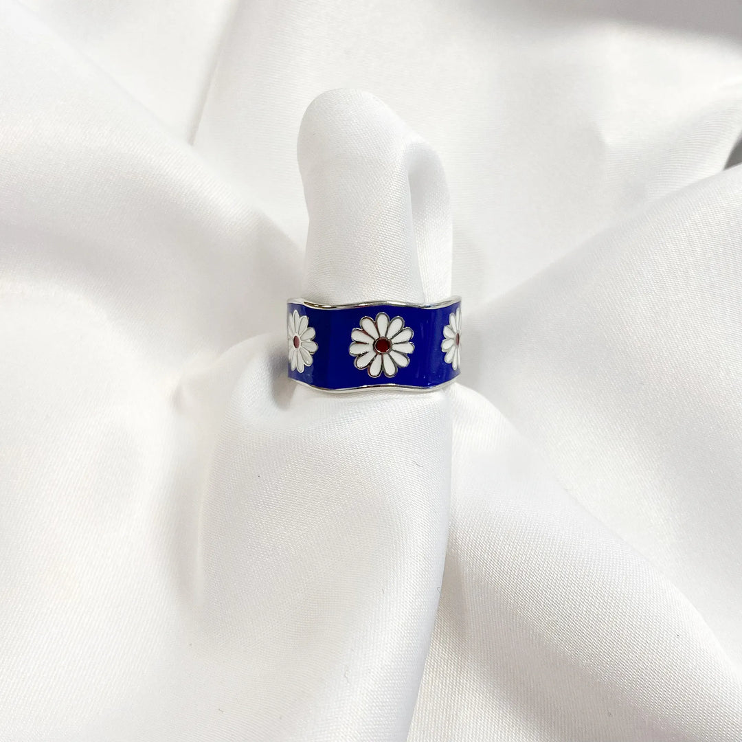 Blå ring med blommor